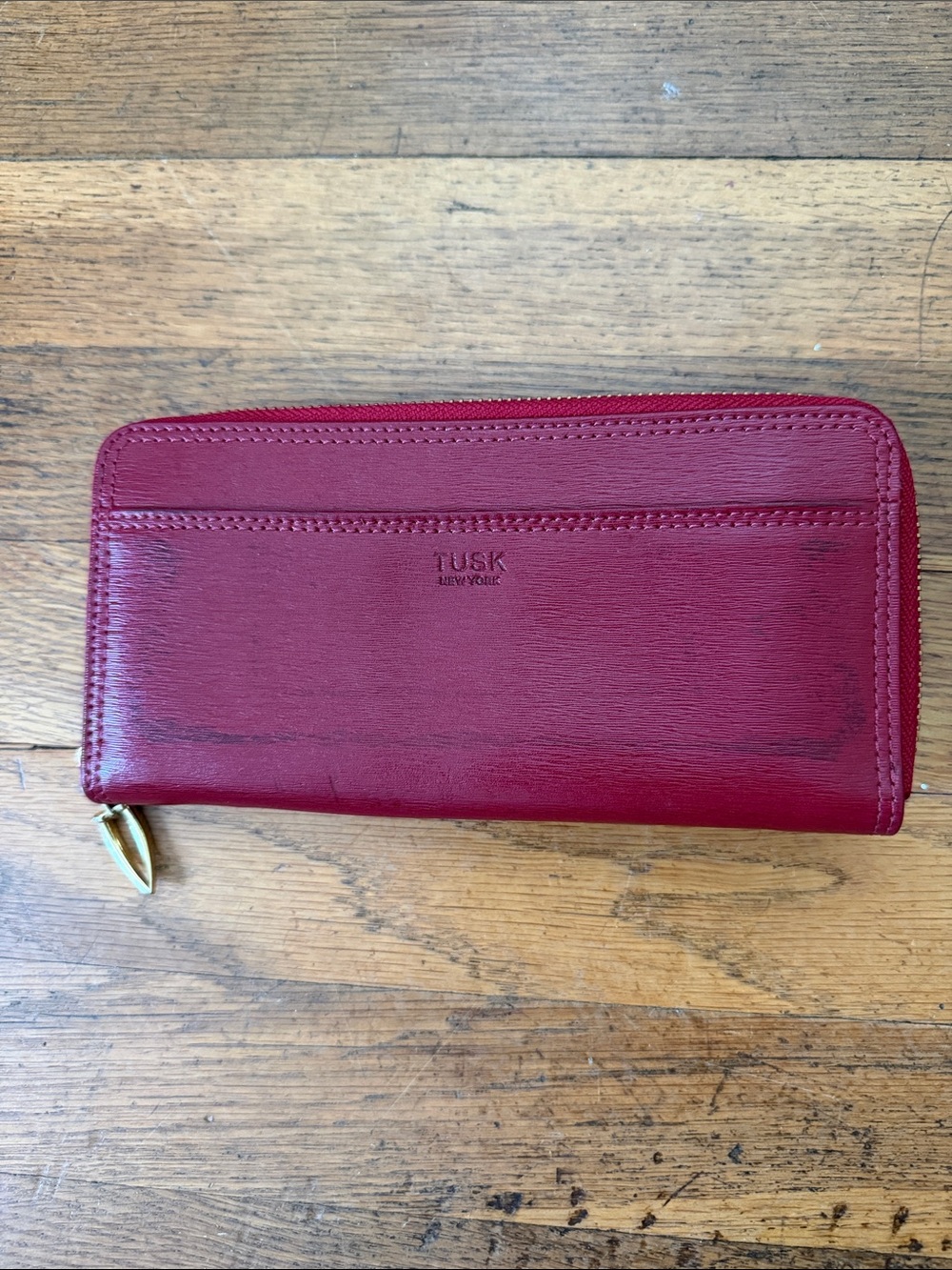 🐘Tusk red leather wallet with gold hardware.